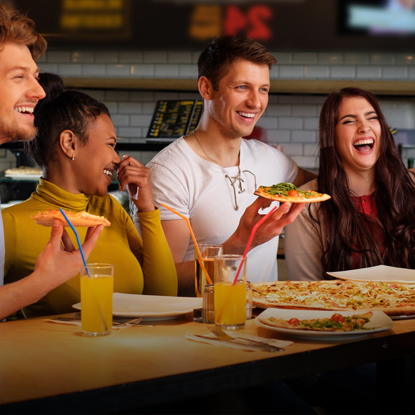 Group of people enjoying a meal together